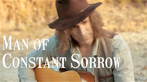 Man of Constant Sorrow A Melancholic Ballad That Transcends Genres Through Its Soulful Vocals and Upbeat Fiddle Melodies